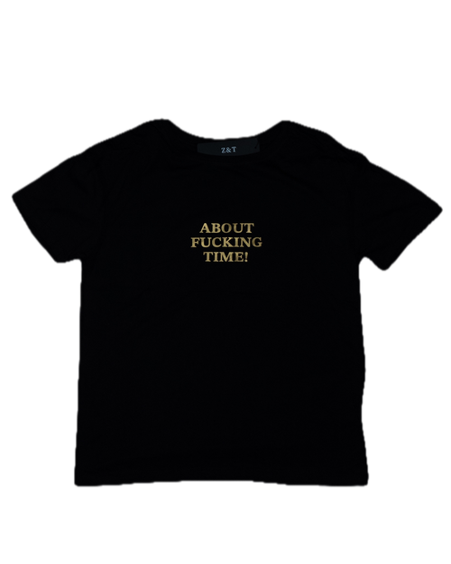 Black t-shirt with gold text on a white background