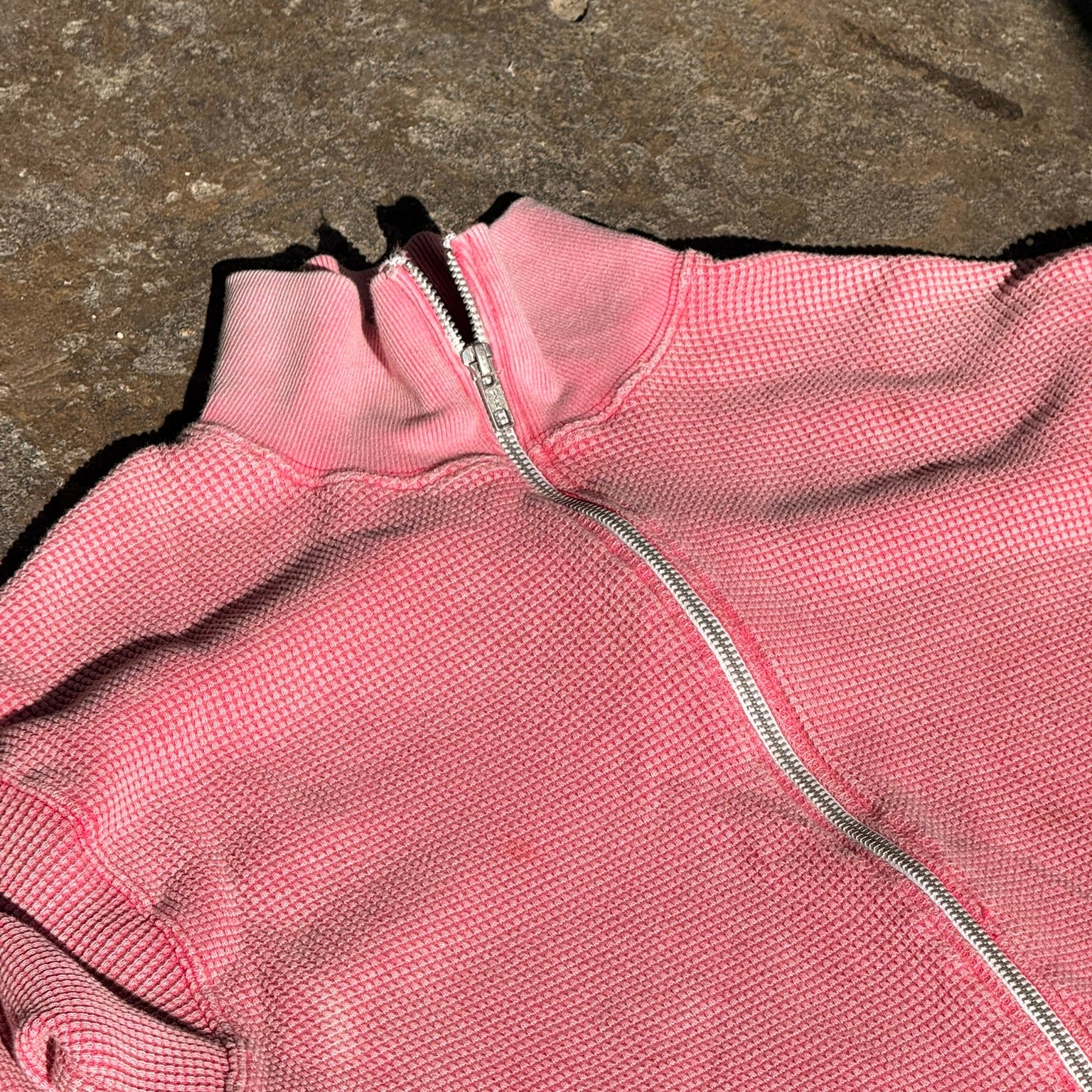 Pink waffle hoodie lay out